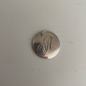 Large A necklace pendant from Tiffany and co